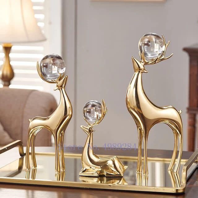 Majestic Golden Reindeer Trio with Crystal Spheres
